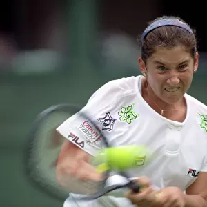 All England Lawn Tennis Championships at Wimbledon. Monica Seles in action during
