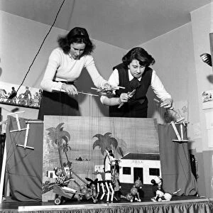 Baley and mother puppet show. March 1953 D106