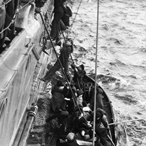 Crew of the German merchant ship Arucas are rescued by a British warship. 3rd March 1940
