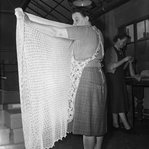 A lace shawl seen here undergoing quality control at The Shawl Factory of GH Hurt