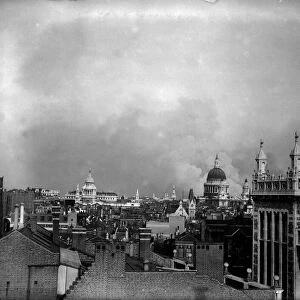 London Blitz Bomb Damage 1940 WW2 Smoke rises from behind the dome of St Pauls