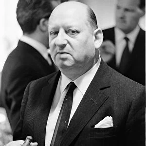 Media Mogul Lord Lew Grade poses for the camera holding a cigar. 24th January 1967