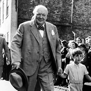Sir Winston Churchill arrives at Westerham church with his grandson Nicholas for