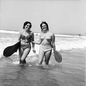 Women body boarding in the surf at Newquay June 1960 M4303-001