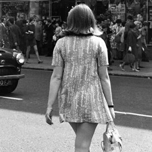 A young wearing a mini-mini dress in height of the swinging sixties