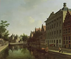 View of the Kloveniersburgwal in Amsterdam, with the Waag, and barge moored in the